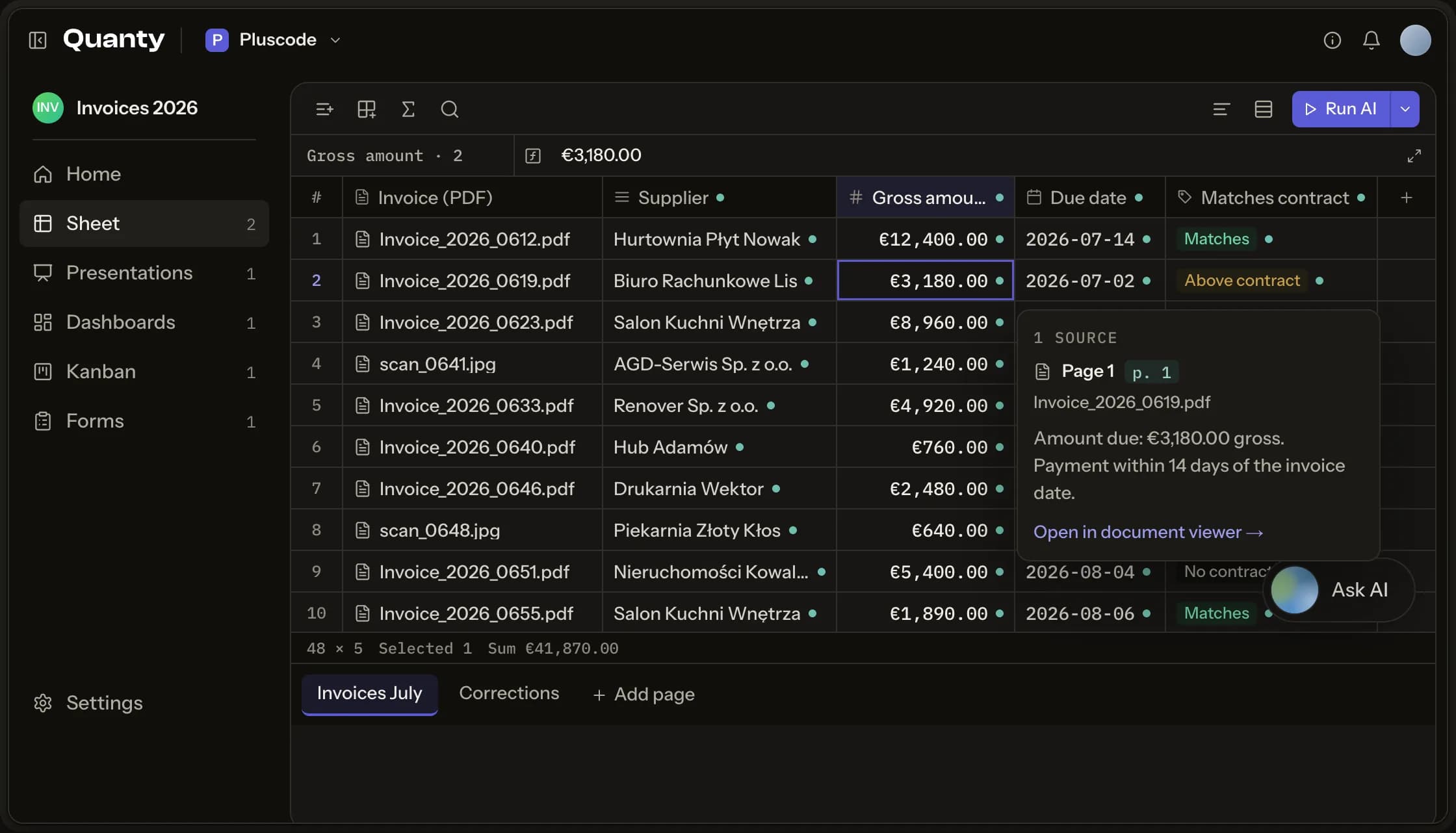 The Quanty sheet with invoices read into rows and the source page open beside a value